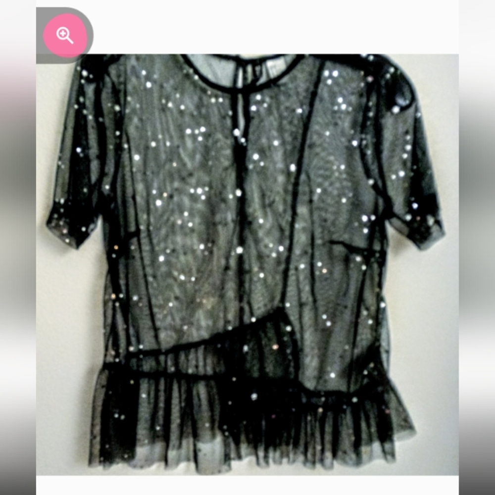 Divided black sheer top
